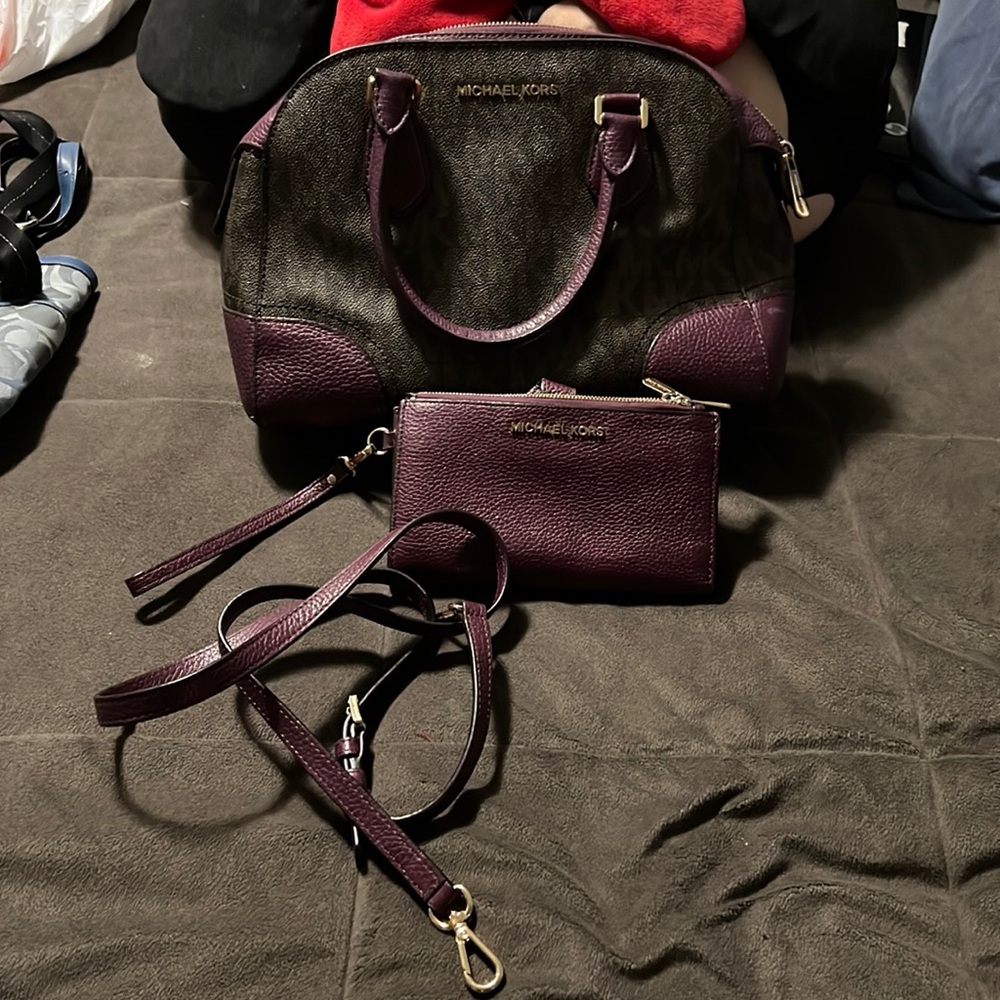 Super cute Michael kors bag with matching wristlet!